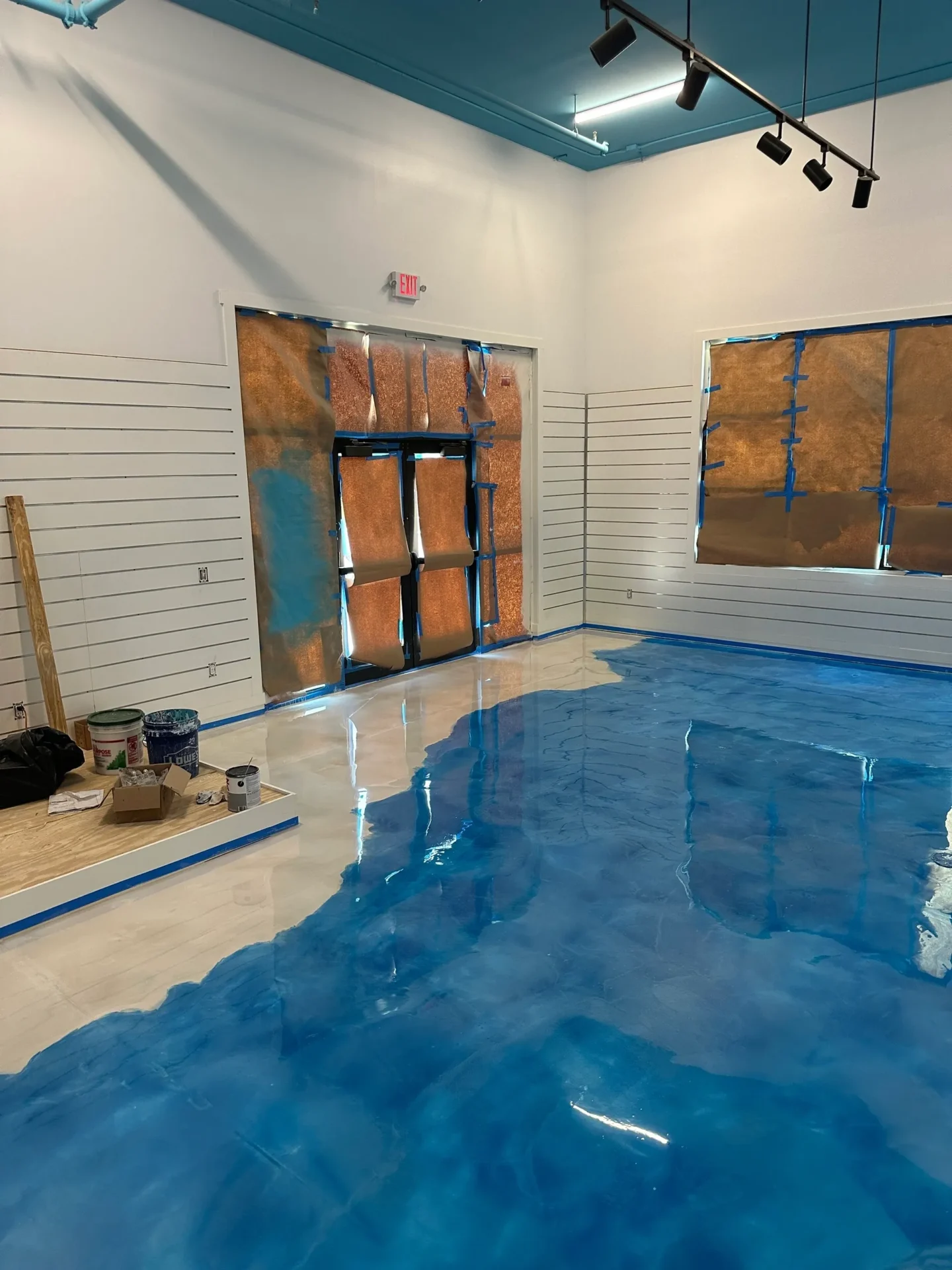 A room with a large pool of water